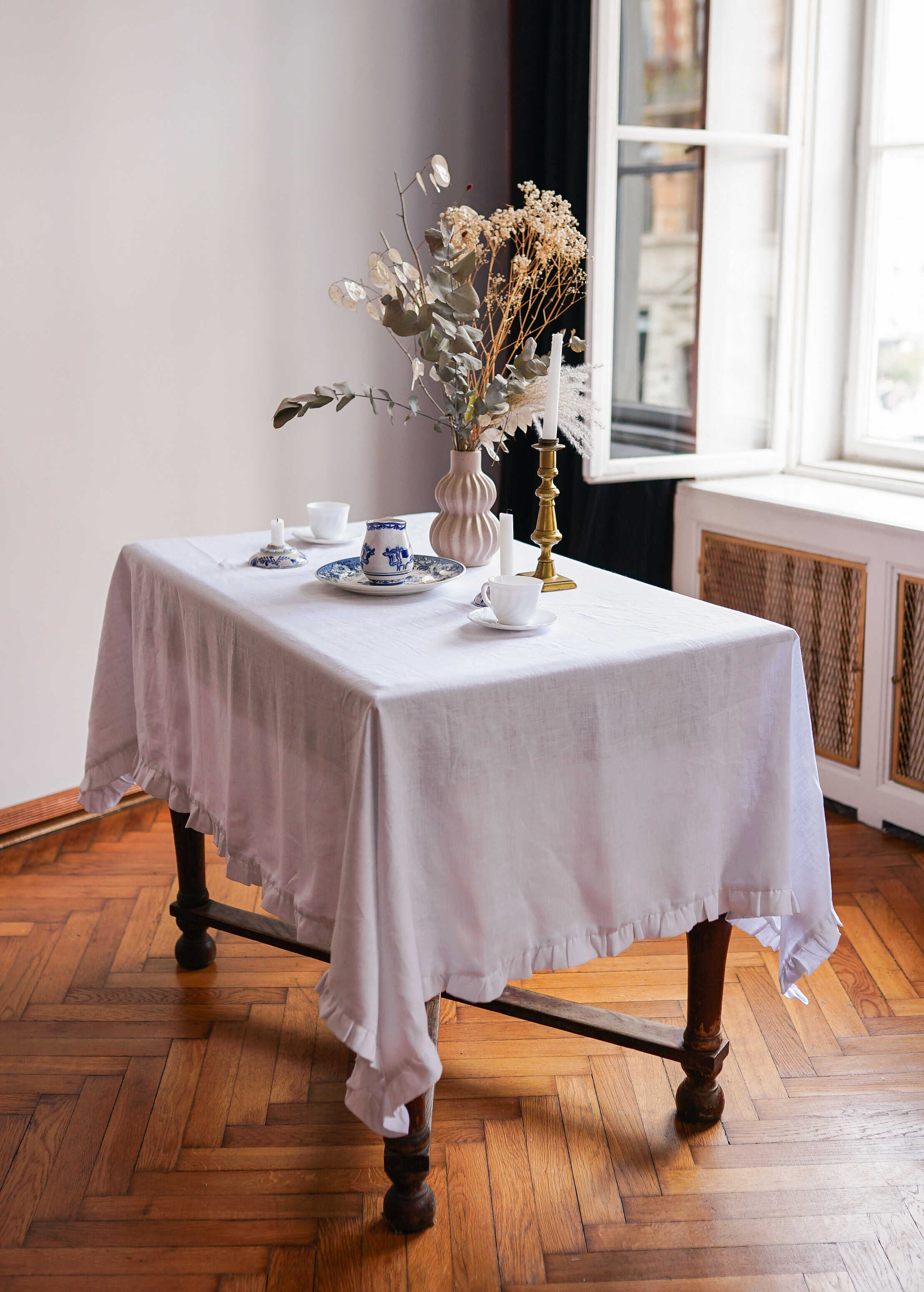 a table with a vase of flowers on it